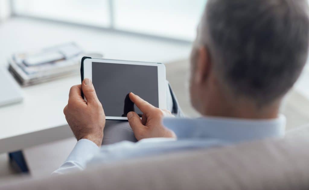 Man using a digital tablet